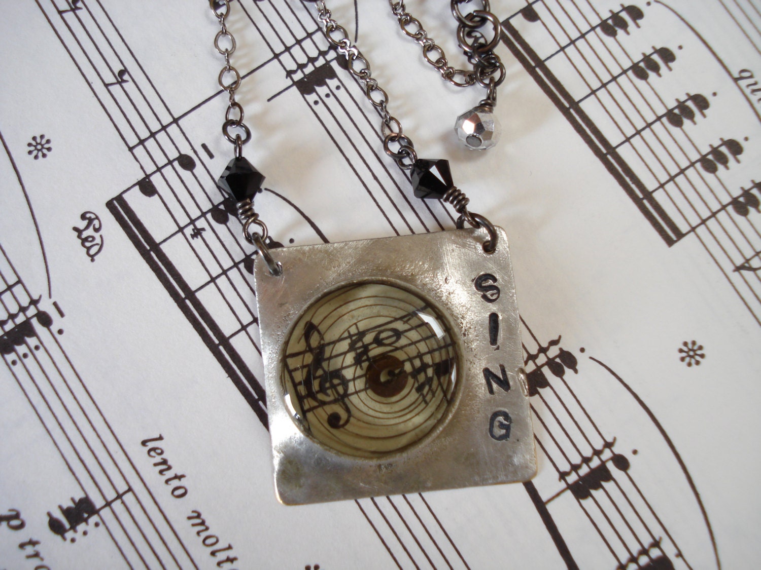Music Jewelry Soldered Pendant says SING