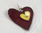 Copper heart pendant, enameled, dark red and yellow, rose back