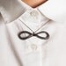 Magnitude Plait - Fishbone - bow pendant (black)