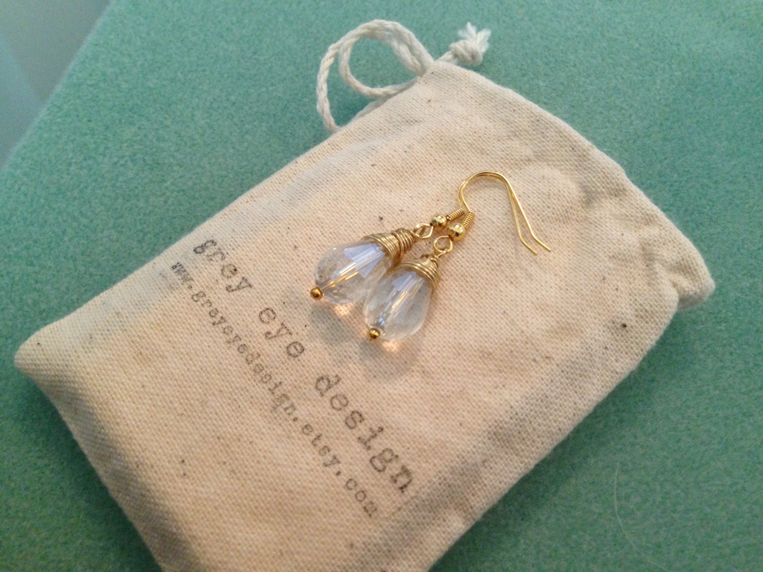 Faceted Crystal Clear Teardrop Earrings Wrapped in Non Tarnishing Golden Wire on Nickel-Free Golden Hooks