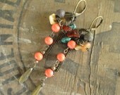 Ablaze.  Vintage beads, oxidized metals, turquoise, amber, bone and chain colorful dangle earrings
