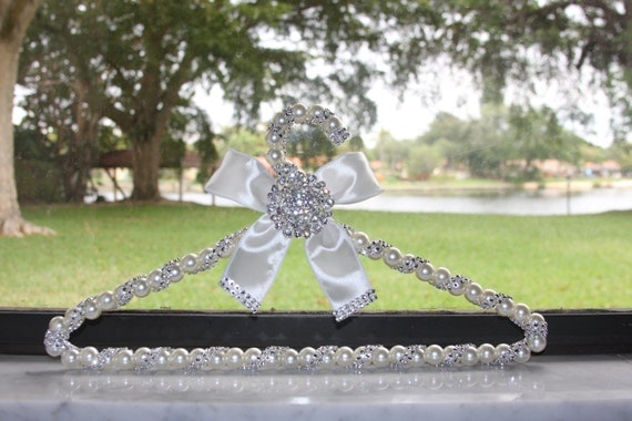 wedding dress hanger with pearl beads, brooch, ribbon and lots of bling makes great gift  and keepsake for bride and entire bridal party