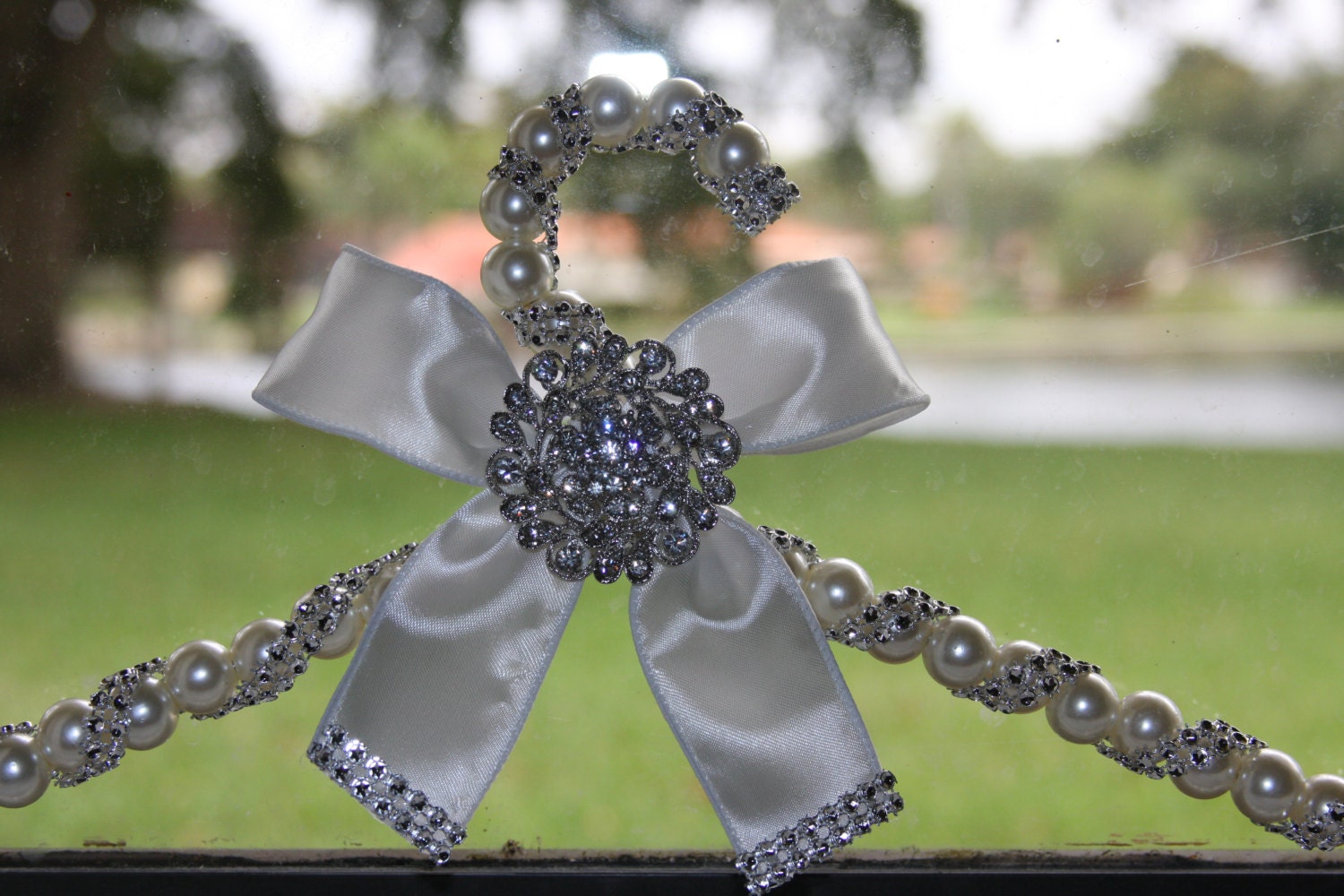 wedding dress hanger with pearl beads, brooch, ribbon and lots of bling makes great gift  and keepsake for bride and entire bridal party