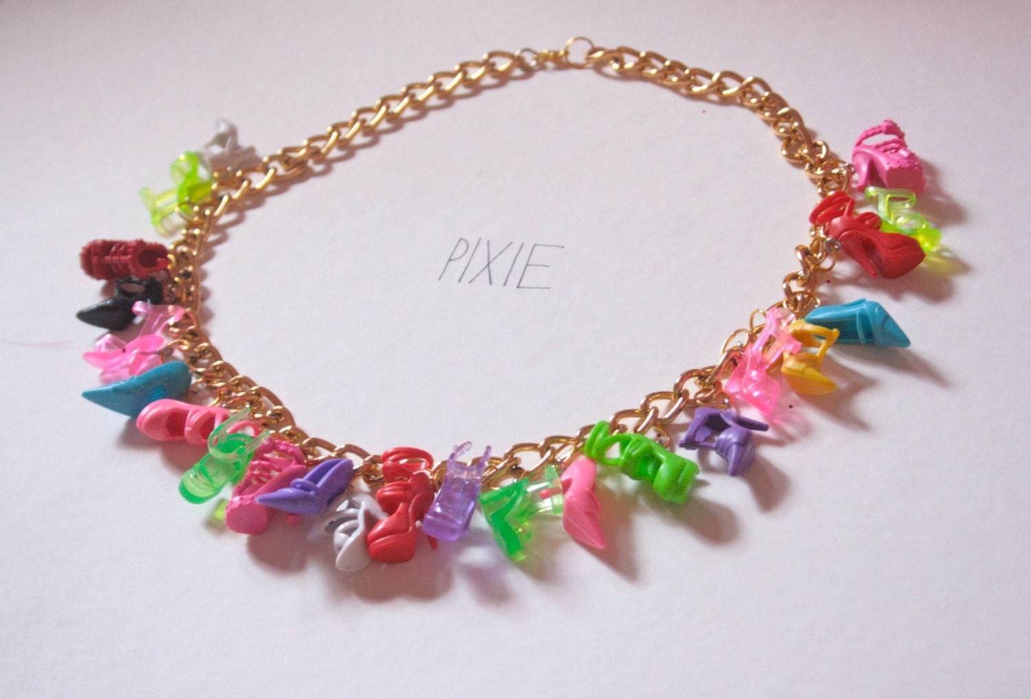 Barbie shoe necklace - Rainbow Doll
