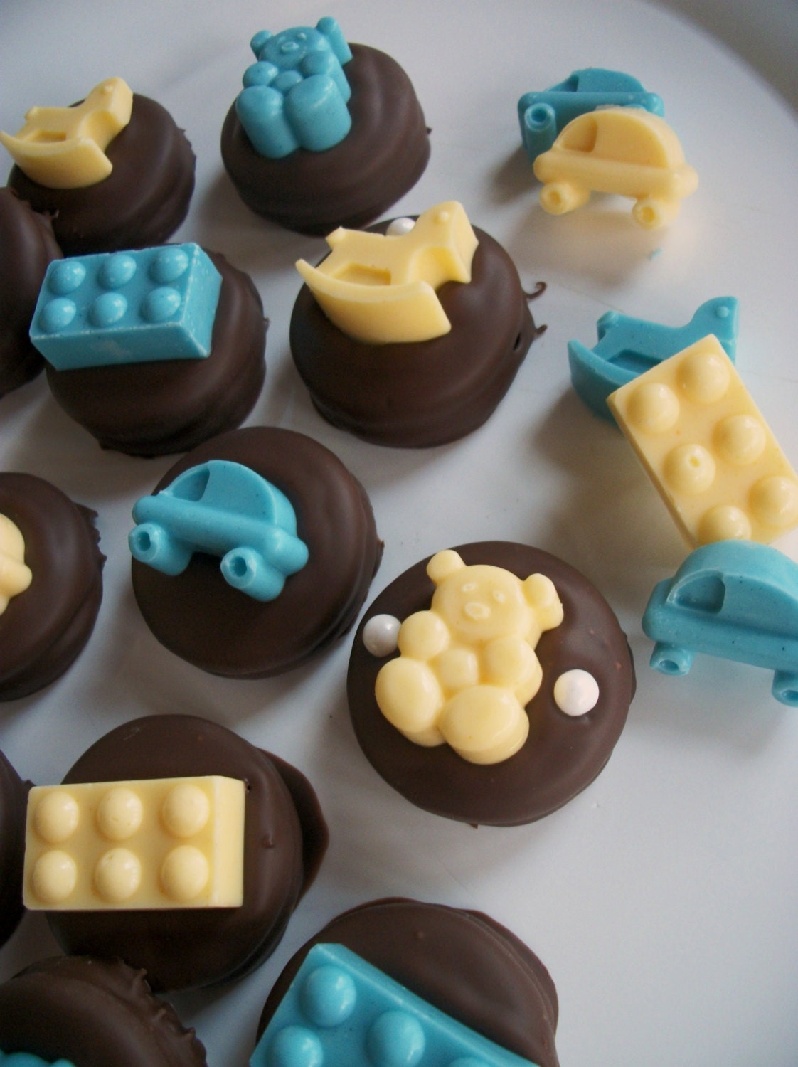 Baby Shower Party Favors Baby Shower Chocolate Baby Toys  atop chocolate covered Oreos, Party favors , Kids Birthdays fun chocolates