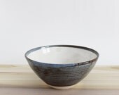 Blue-brown and white medium ceramic pottery bowl