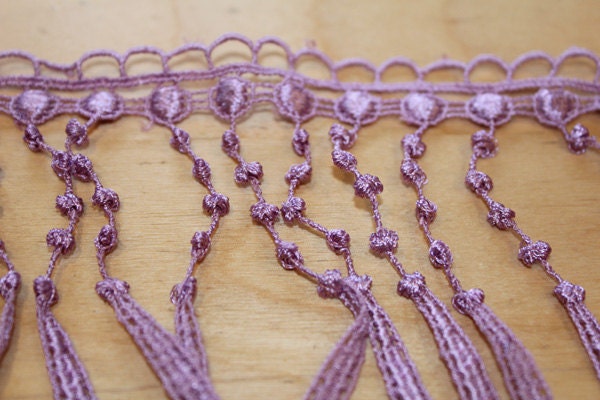 Purple tasseled trim