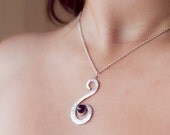 Hammered Swirly Silver Pendant with Blue Stone