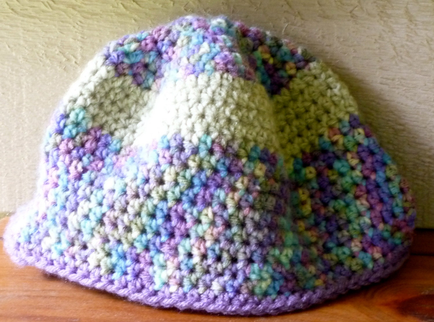 Crochet beanie hat handmade multi colored contrast blue purple green variegated