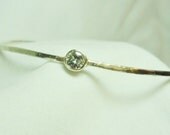 Kelly's Bangle: A Bezel Set 5mm/Half-Carat Moissanite Solitaire Setting Sterling Silver Bangle