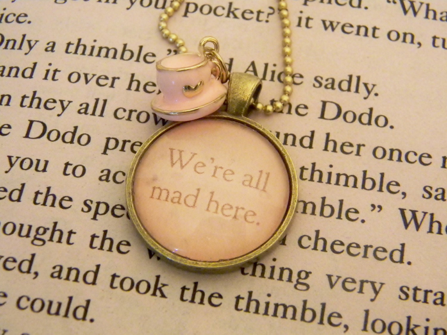 Cheshire Cat Quote Necklace. We're All Mad Here Alice in Wonderland Necklace. 18 Inch Bronze Tone Chain.