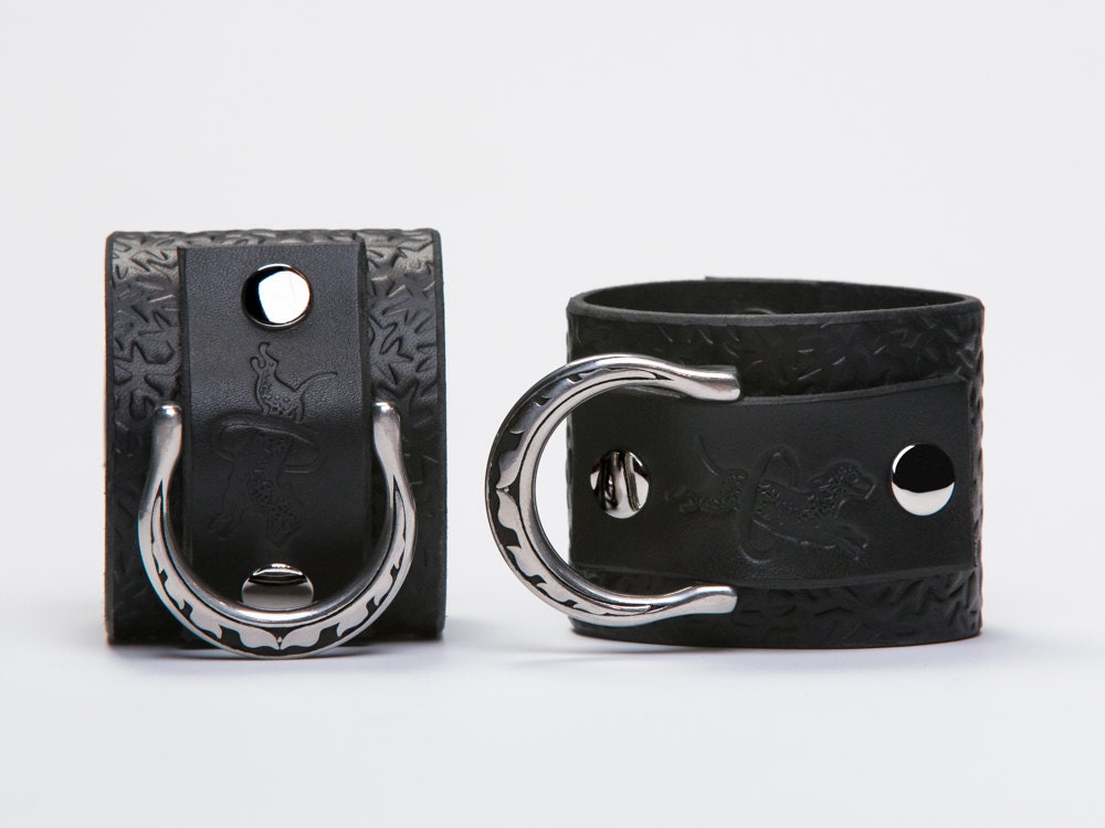 Leather Bondage Cuffs - Black Latigo - Embossed with Thorns - Steel Lead Ring -  Feather Motif