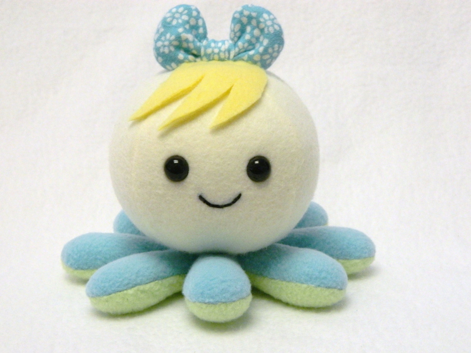 Spring octopus plush with aqua flower bow