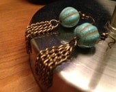 Dangle earrings -Faux turquoise with Bronze Tassels 
