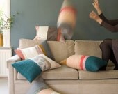 Landscape cushion of wool felt and handprinted designs based on Dutch landscapes