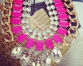 The CASSANDRA Is A Gold or Rose Gold Chain Necklace With Tear Drop Rhinestones