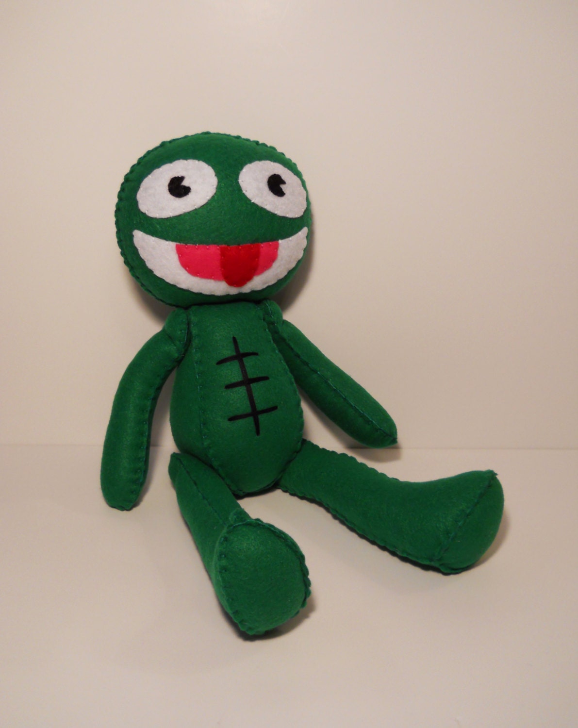 clyde frog plush toy