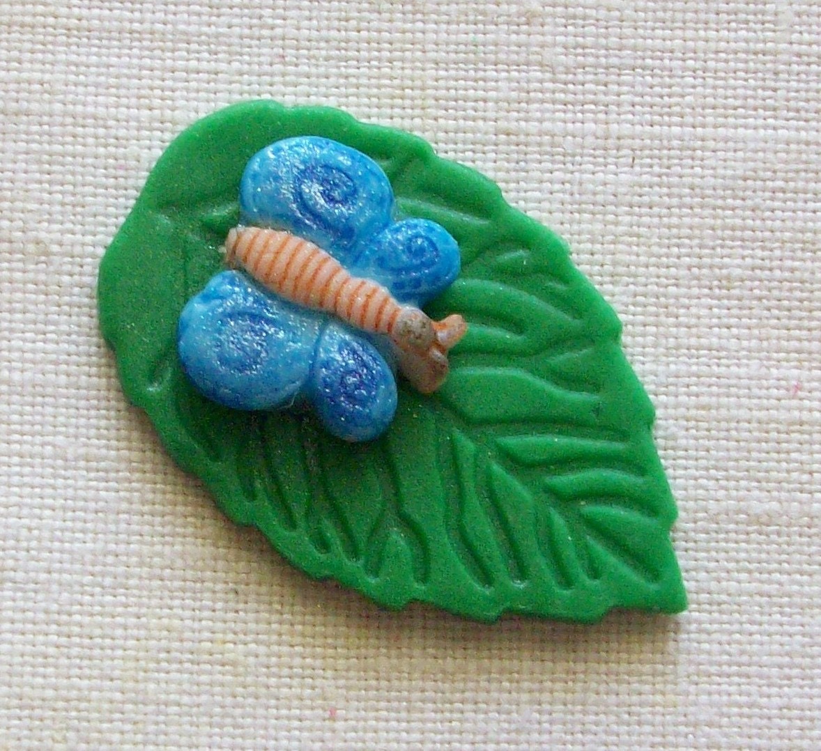 Fondant butterfly on leaf, fondant cupcake toppers, cake toppers, edible party favor, fondant miniature