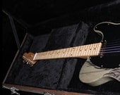 Handcrafted crowcaster guitar