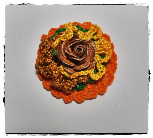 Orange green brown yellow floral crochet embellishment