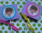 12 doc mcstuffins lollipop cover w/ lollipop, great for party favors... also for lalaloopsy, strawberry shortcake, Dora and ninjago...