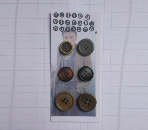 6 Vintage buttons on a card.
