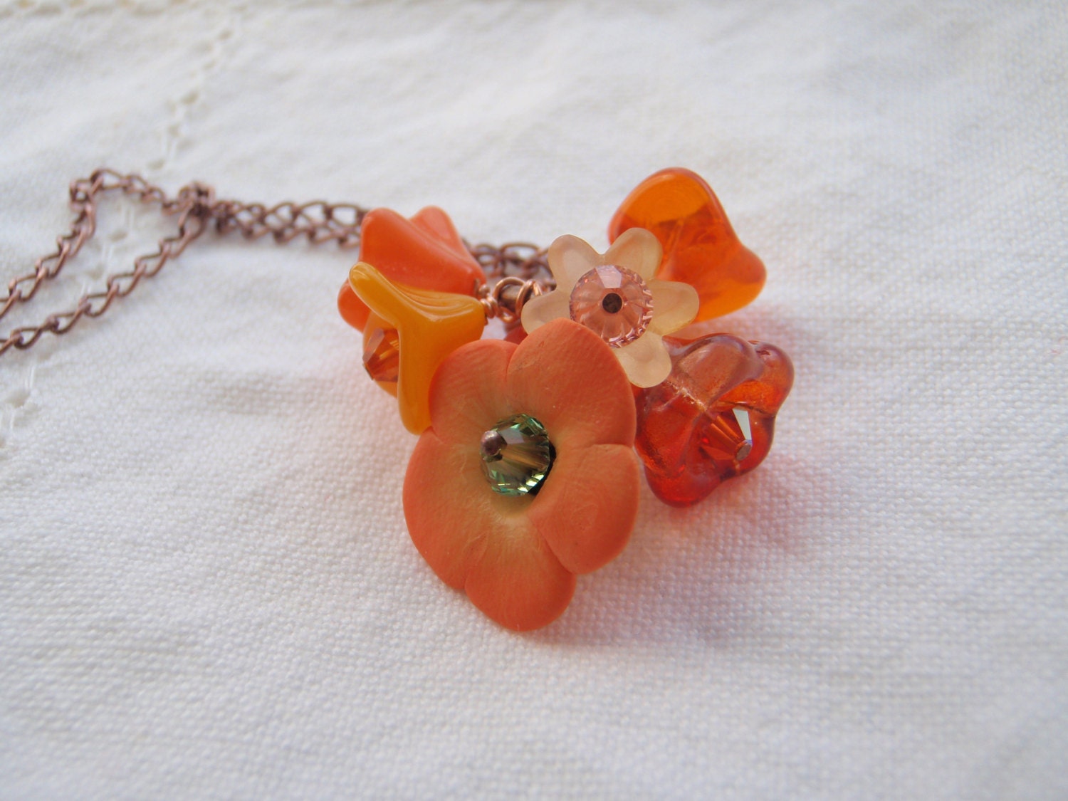 Bright and Vivd Orange Necklace with Handmade polymer clay, Czech glass and lucite Flowers with Swarovski Crystals and Copper Chain