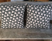 Pair of Gorgeous Black and White Cushion Covers with Red, White Daisy on Black Background with Dottie Polka Dots Fabric on Back