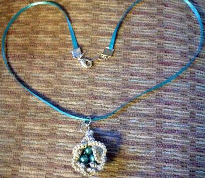 Tatted Bird's nest necklace with green pearls