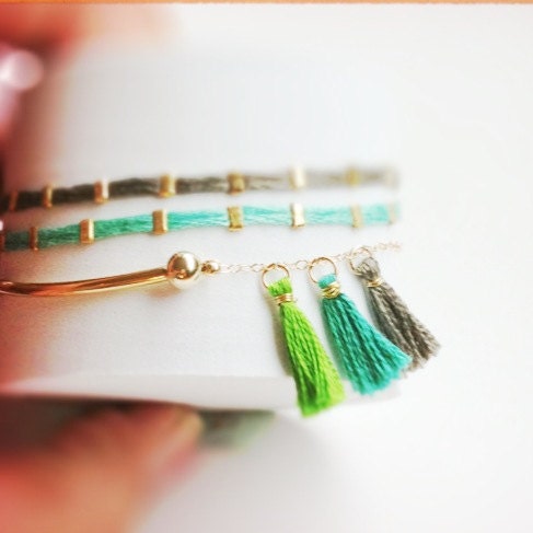 Arm Candy Multi row bracelet stacks with fun. tassels.Trendy Spring colors. For everyday