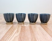 Small blue ceramic cups