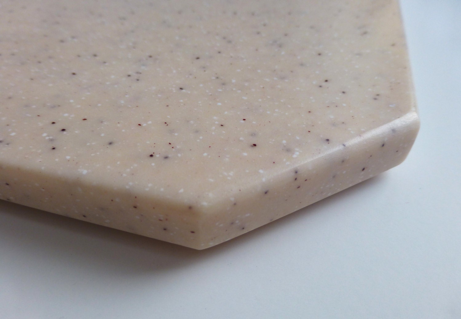 Cutting Board in Light PInk with Black and White Speckles, Solid Surface - Kitchen Wares
