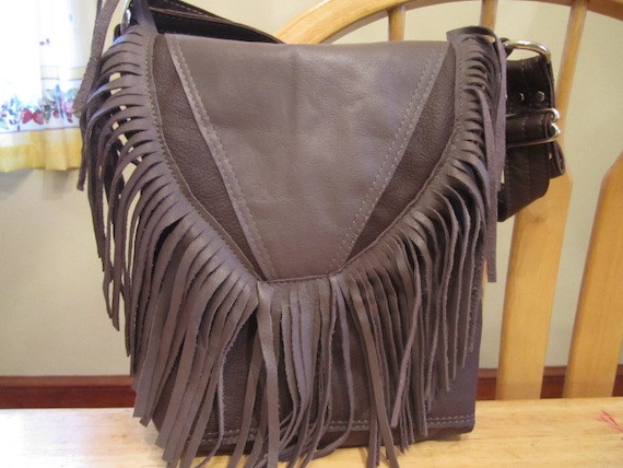 Dark Plum and lavender gray leather bag with fringe on flap and adjustable shoulder/arm strap