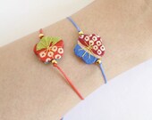 Sliding knots bracelet - flower of japanese kimono print fabric with 24K gold plated beads