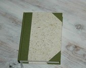handmade, handcrafted paper covered notebook, journal, note book with green edges in linen