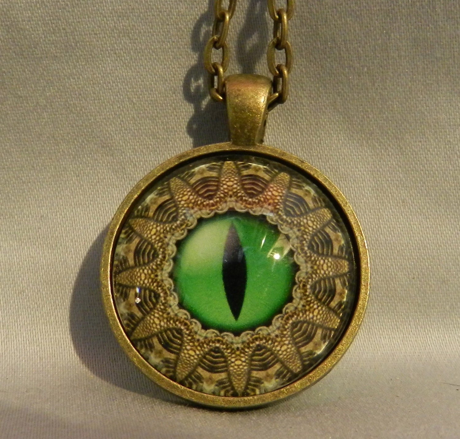 Steampunk Green Dragon Eye Pendant Necklace 1" Glass Dome Cover Jewelry Charm Round Circle - Plated Silver or Brass or Copper or Black