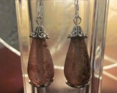 Adorable amber-like lampwork glass, silver, 925 earwires.