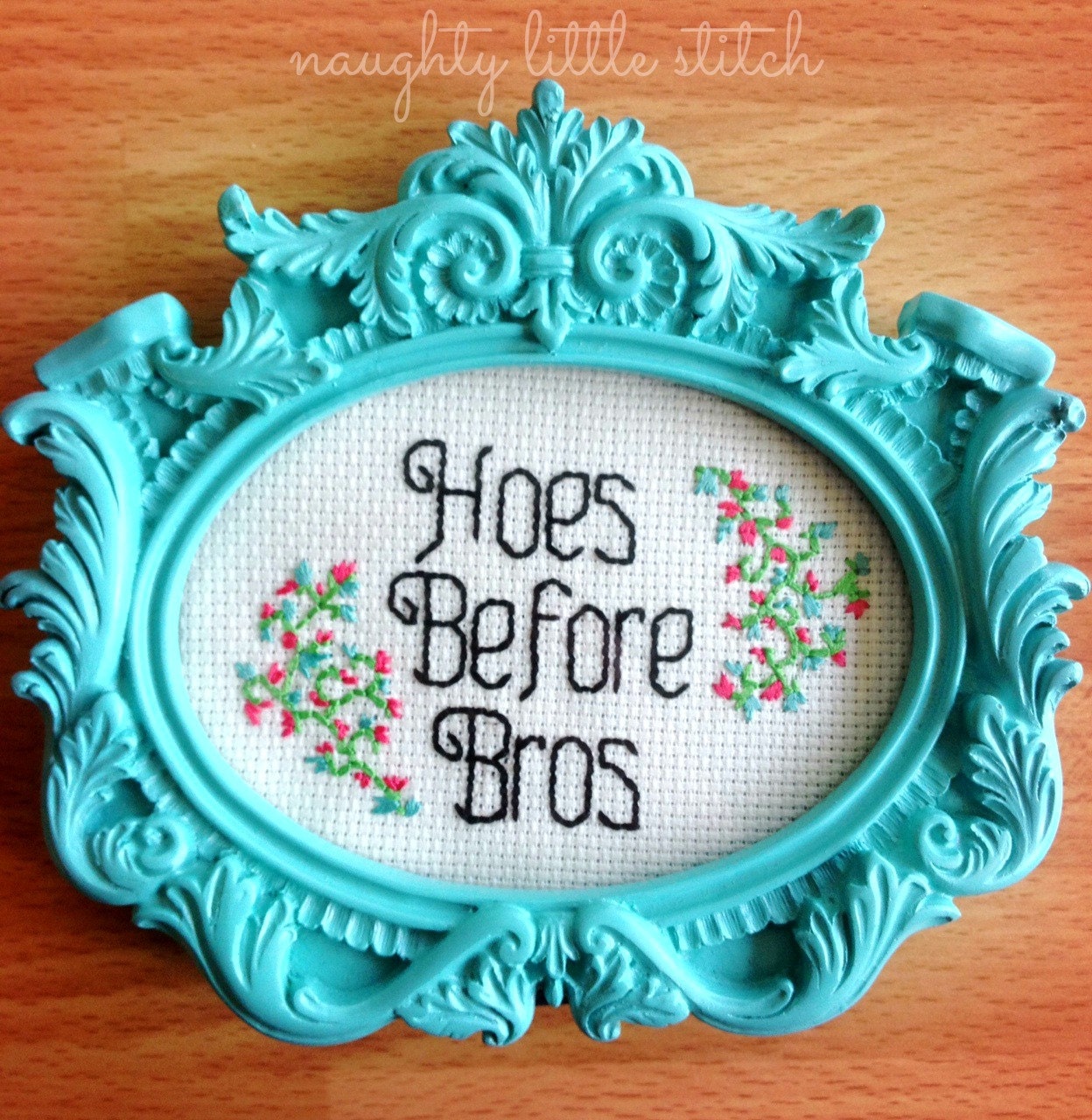 Hoes Before Bros - Finished and framed cross stitch - ornate turquoise frame