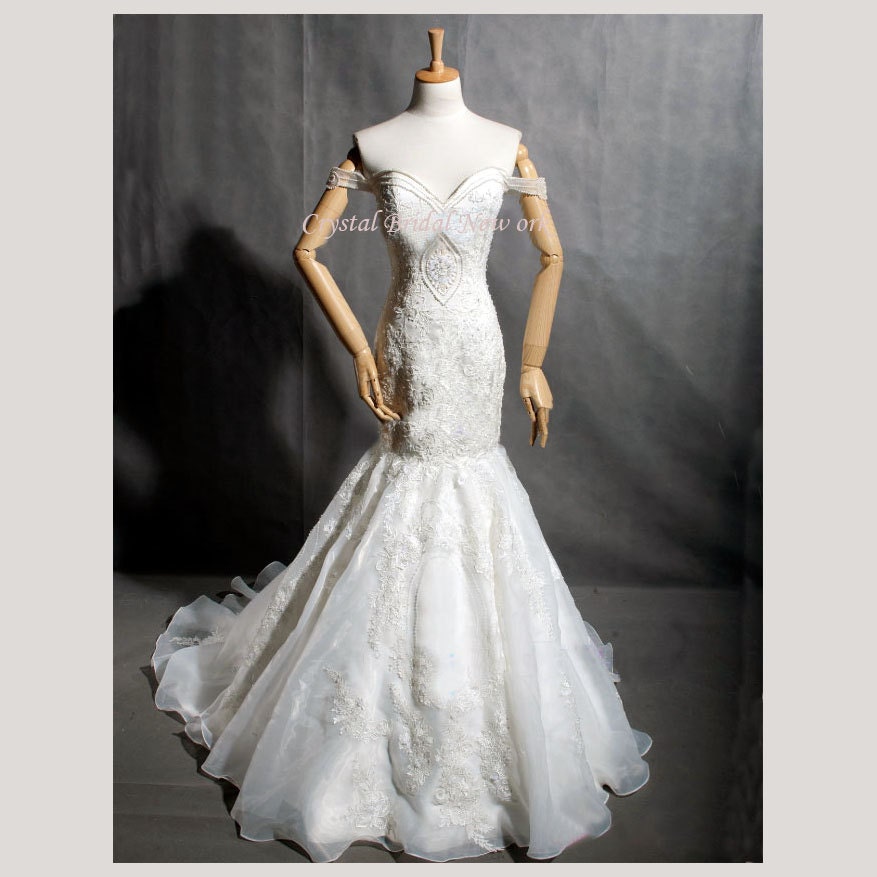 Off the shoulder sweetheart intricately handmade luxurious lace mermaid flared wedding gown with open back veil