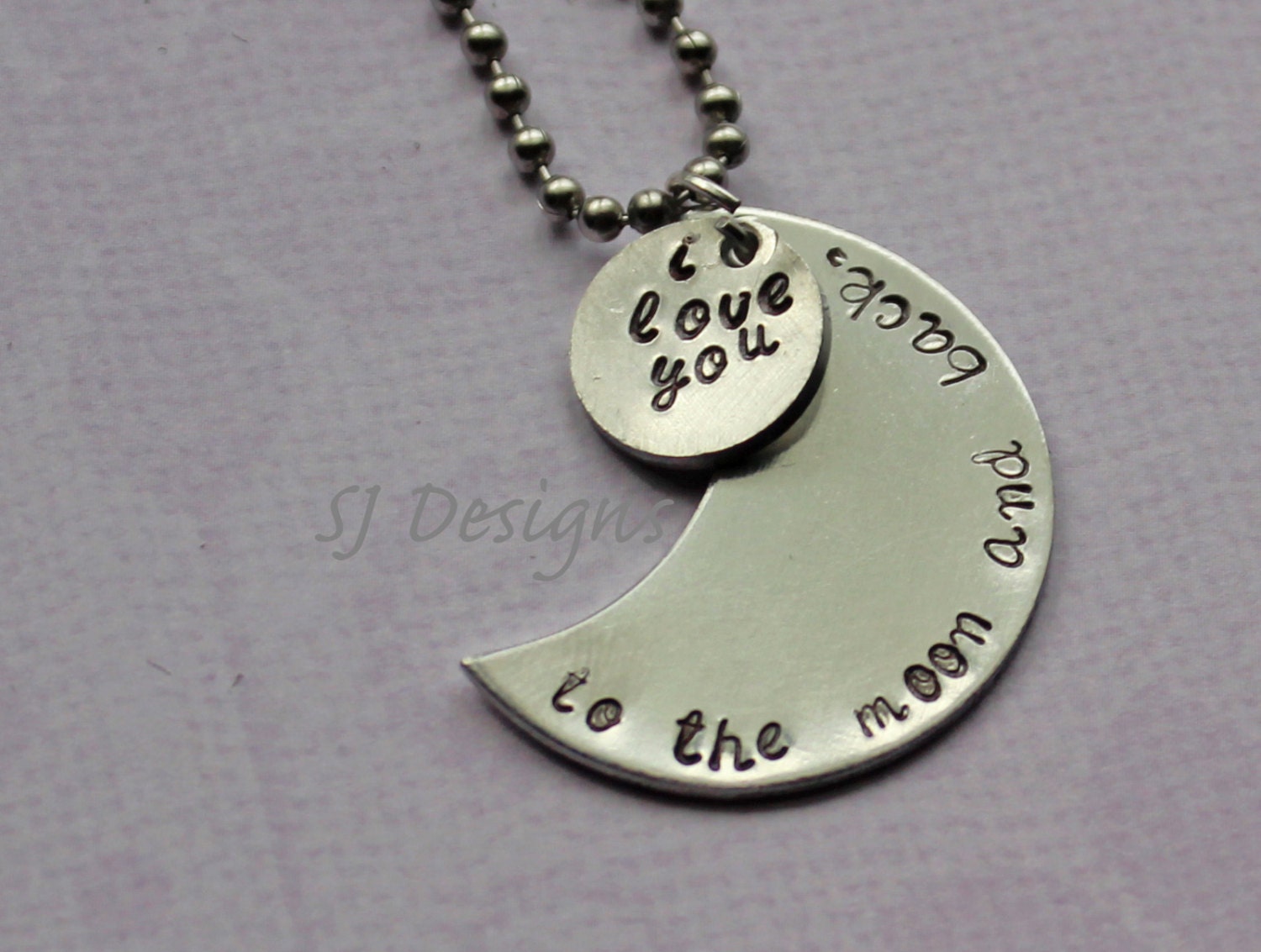 Hand Stamped 'i love you to the moon and back' pendants