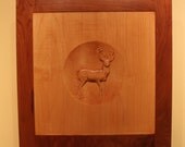 Gun cabinet with deer carving