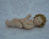 1/12" scale all bisque sexed baby girl doll.....2.1/2" long....golden blonde