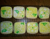 12 yellow, white, and green hand-painted flower sugar cookies