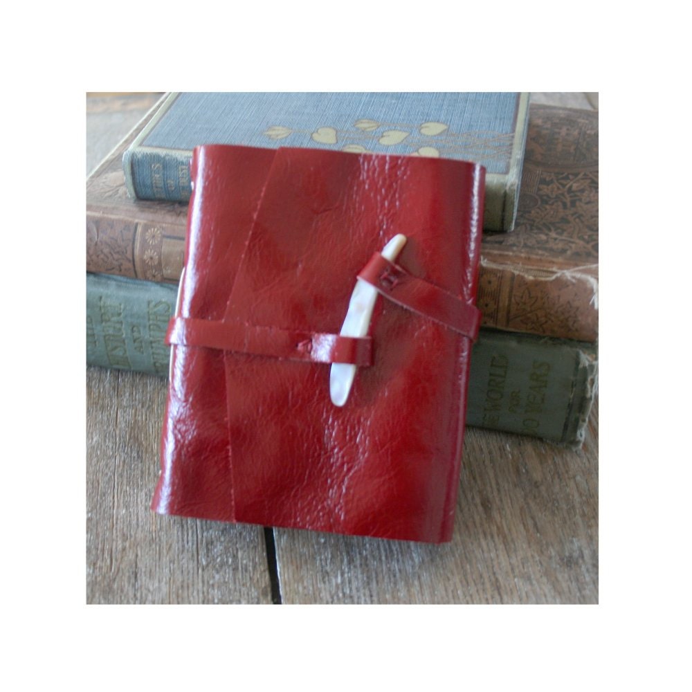 Leather Journal . candy apple red  with shell peg . handmade handbound (320 pgs)