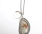 Crazy lace agate and sterling silver charms.