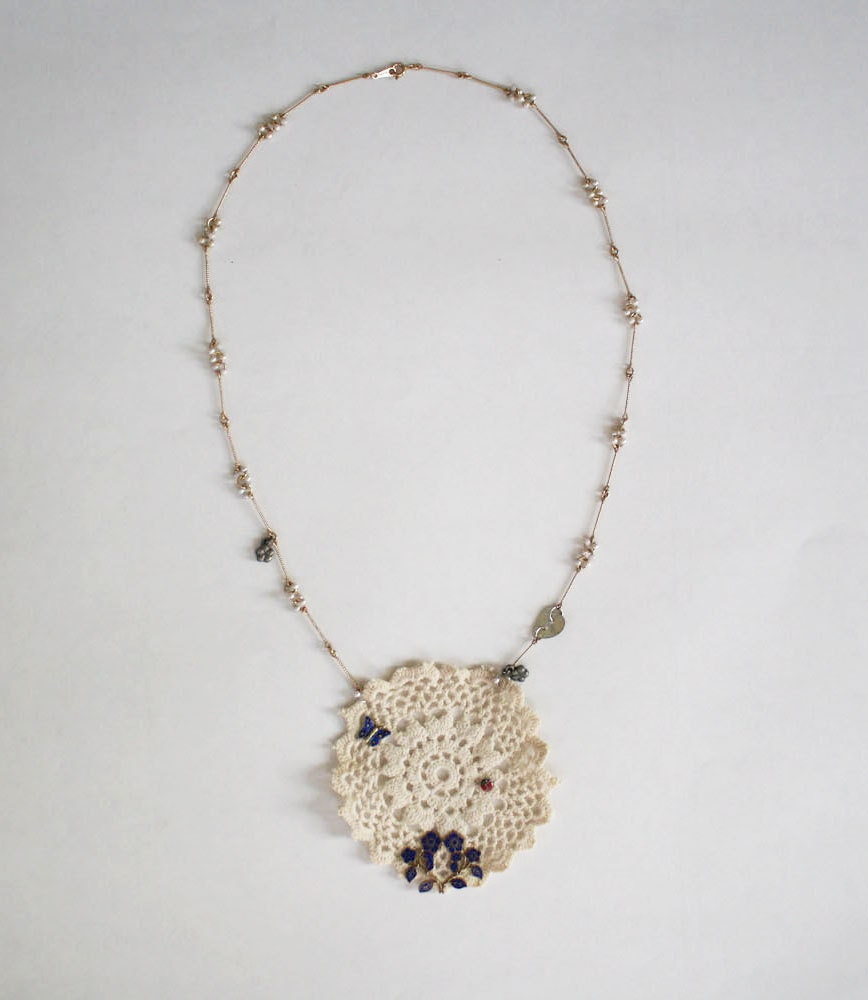 Antique Doily With Enameled Flora and Fauna On an Avon Pearl Neckalce