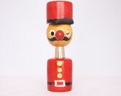 Winking police officer salt and pepper shaker