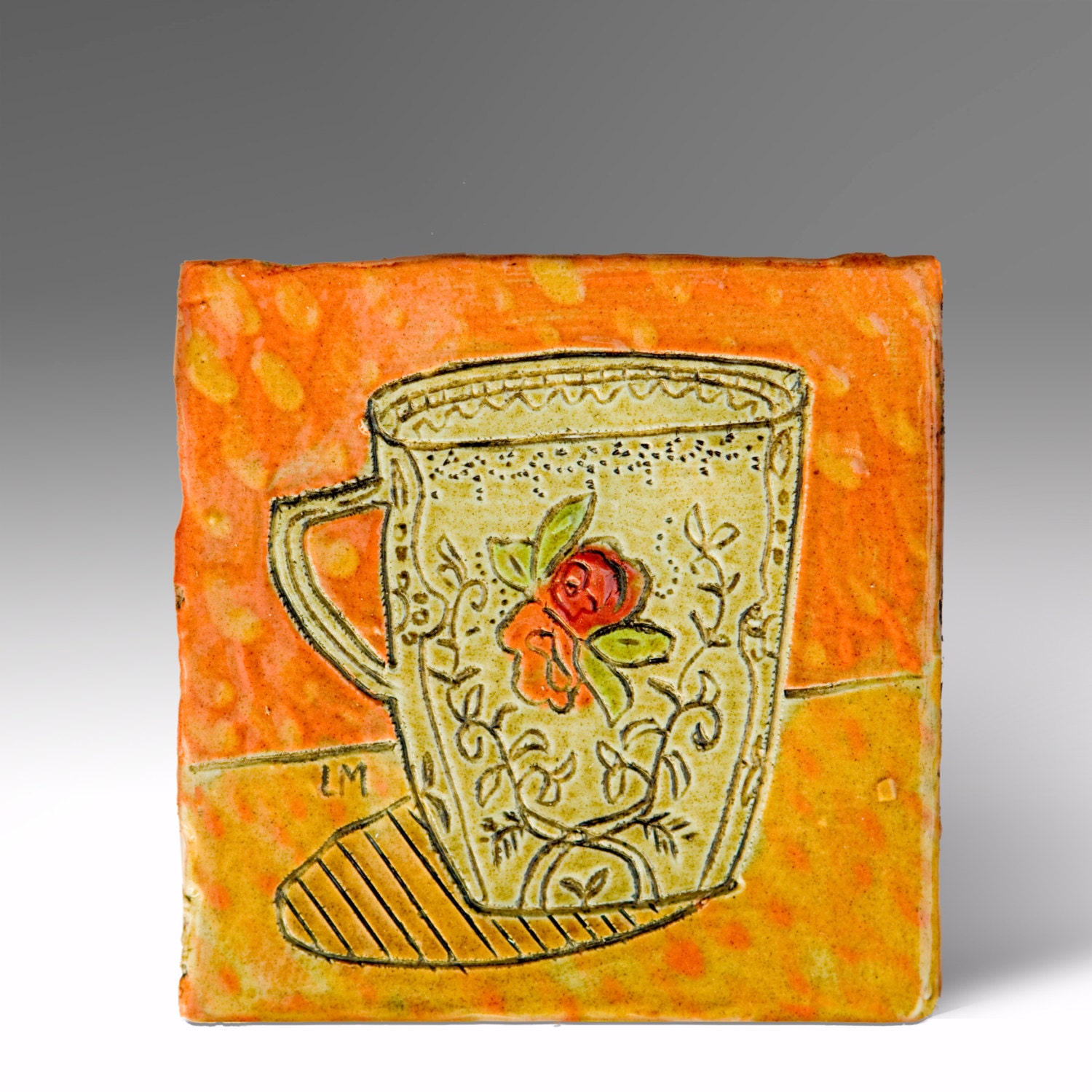 Cup of Tea. Slip decorated picture tile.