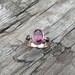 2.55 ct. Rubellite Tourmaline with Black Star Sapphires in 14k rose and white gold