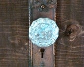 A Pair of Antique Glass Door Knob and Wood Wall Hangers
